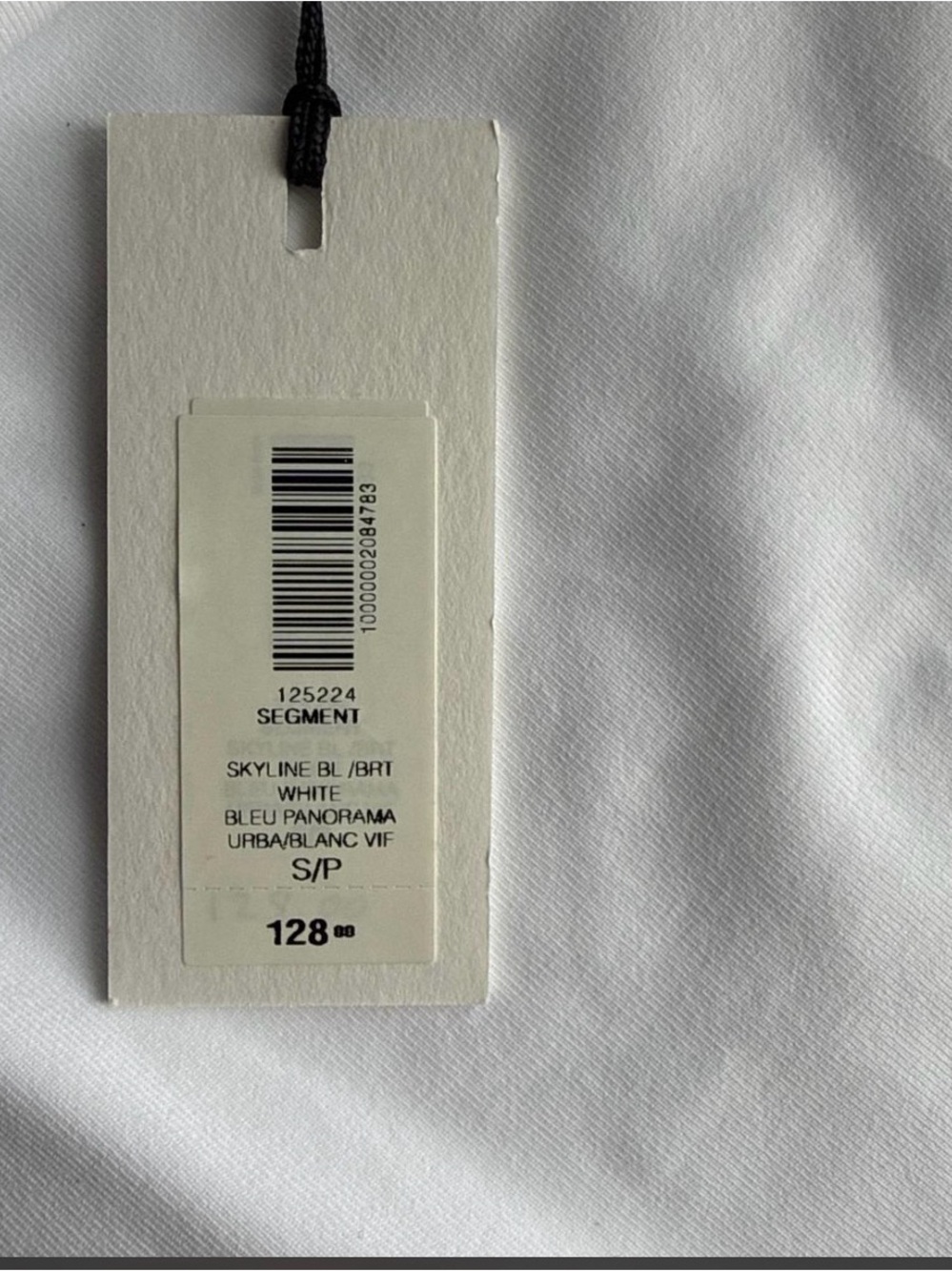 Babaton White Tag on Light Blue Fabric - Picture 3 of 3